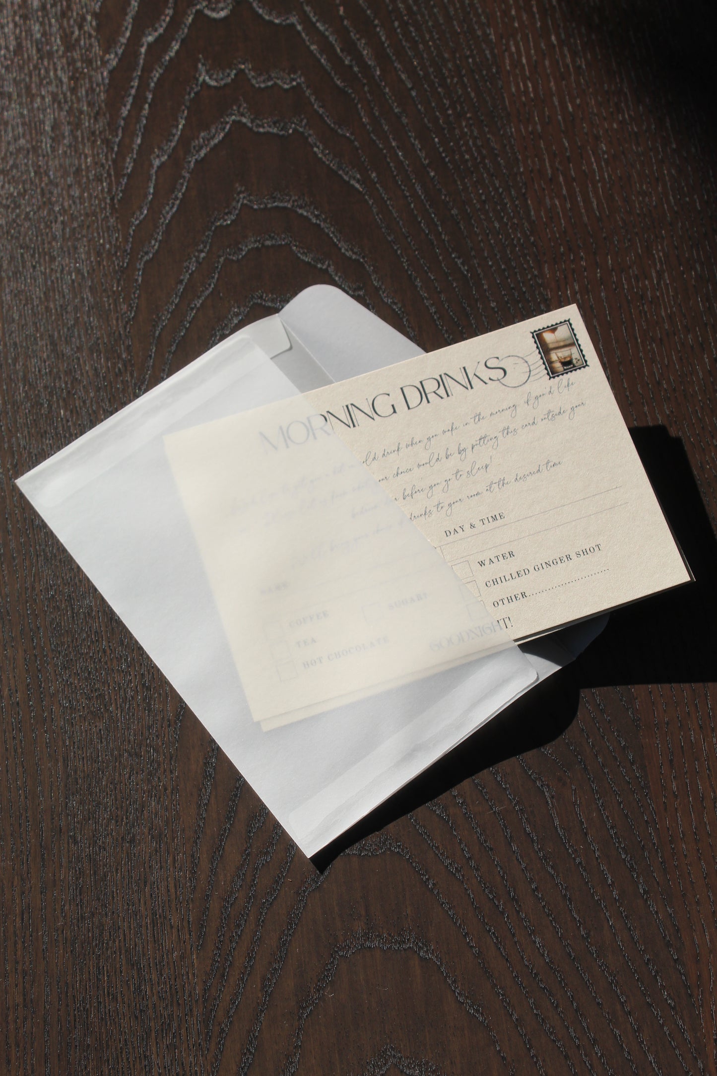 Vintage letter inside an open envelope on a wooden surface