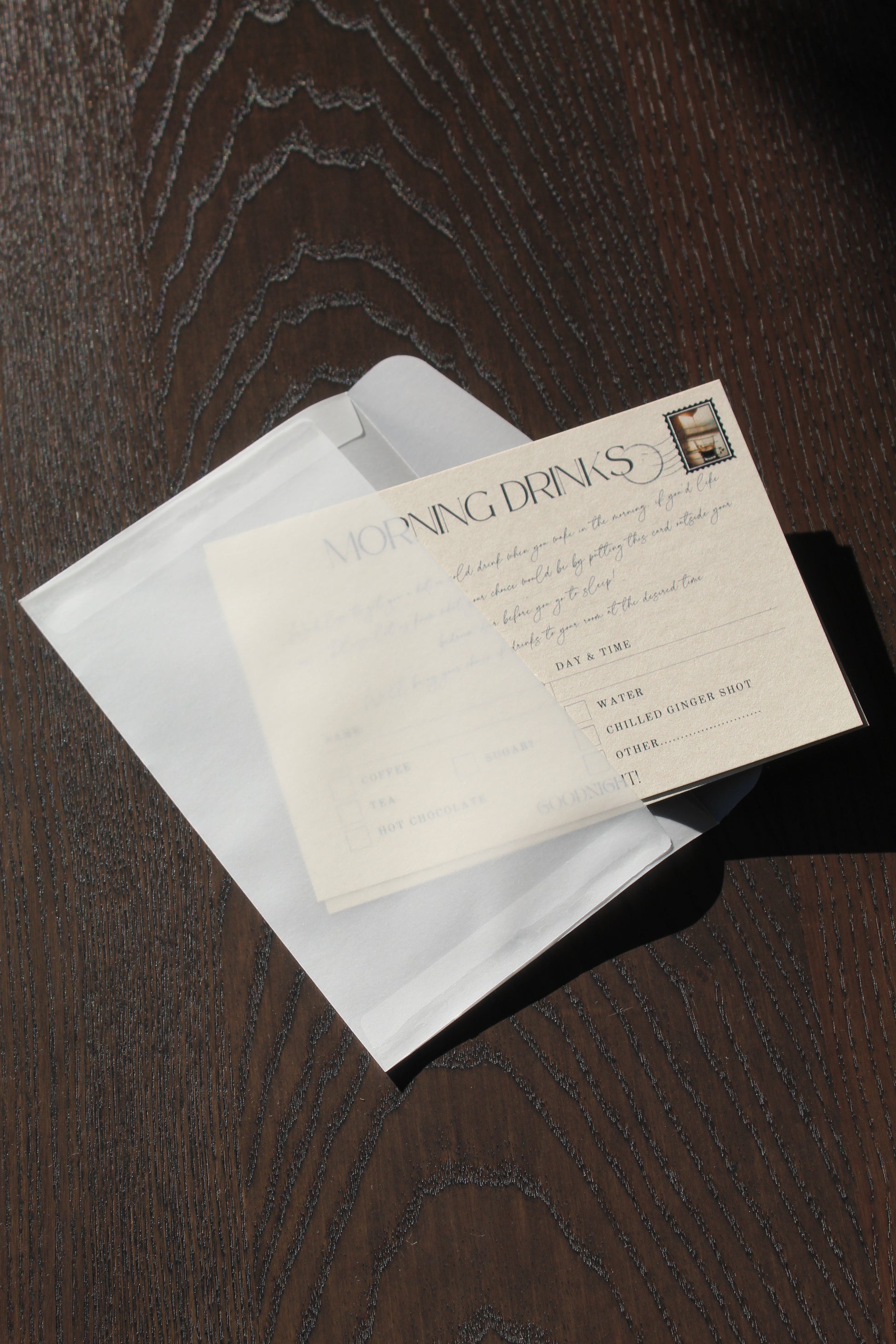 Vintage letter inside an open envelope on a wooden surface