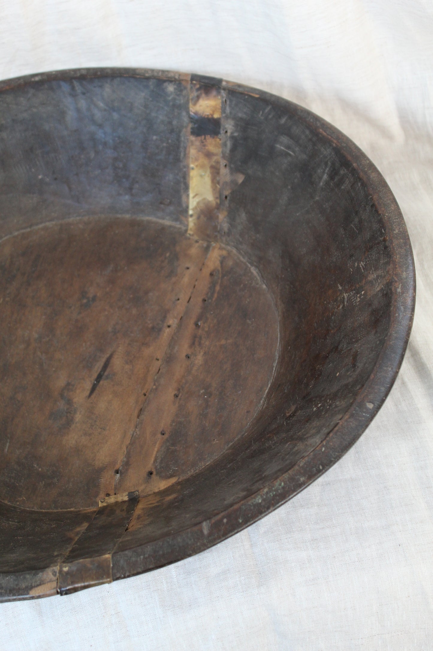 Close-up of a wooden bowl on a white background