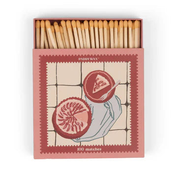 Box of matches with a decorative design on the lid