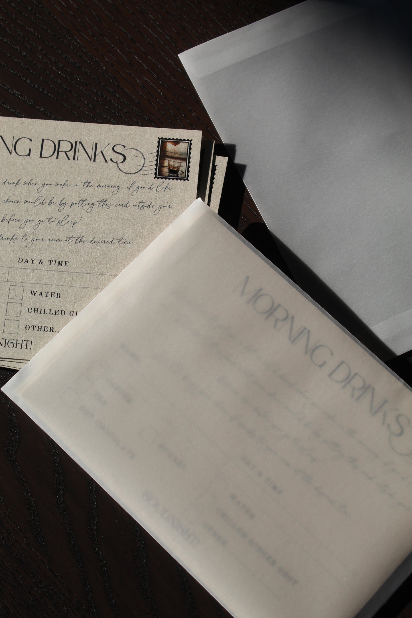 Documents with 'Morning Drinks' text on a dark surface