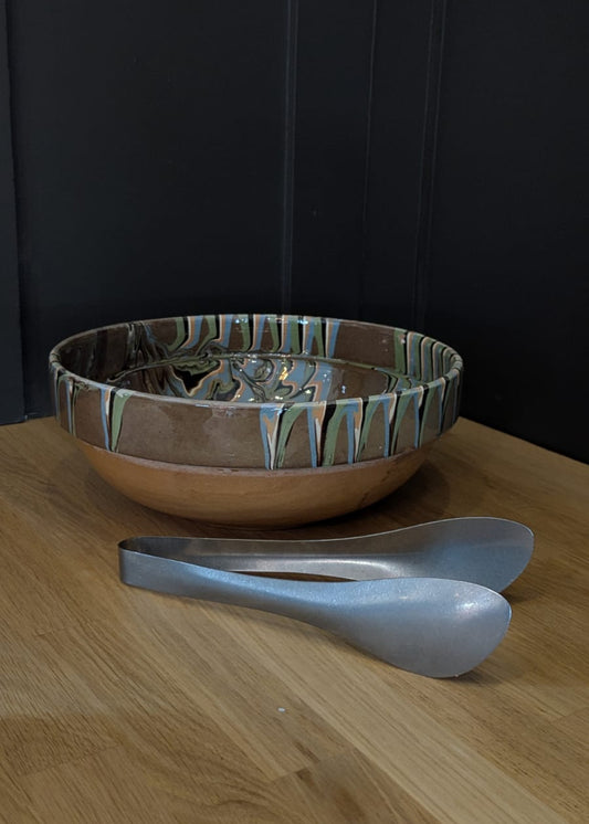 Stonewashed Tongs beside Marbled Bowl